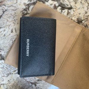 Burberry black wallet.